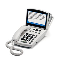 Telephone with small buttons and a screen with words typed up on it.